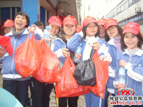 三创四化：团县委组织106名“小红帽”开展文明劝导