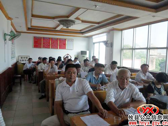 攸县新市镇组织各村支书进行半年工作述职