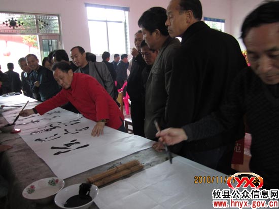“攸县精神”表述语现场书写笔会在新市镇新联村举行