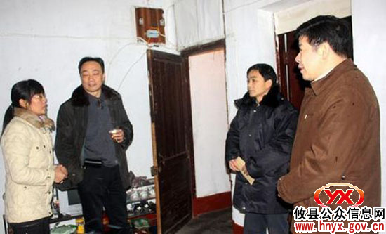 邝邹飞一行顶风冒雪走访慰问部分困难劳模和职工