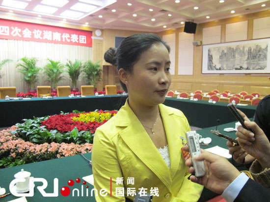 谭艳：民生政策惠老区 科学发展尝甜头