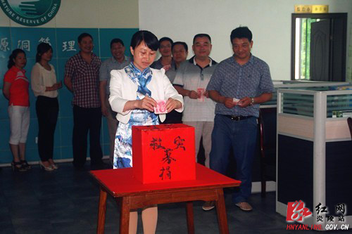 洪水无情人有情 爱心善款暖人心