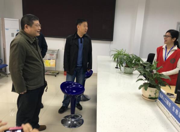 市残联到建设街道验收残疾人工作示范街道创建工作