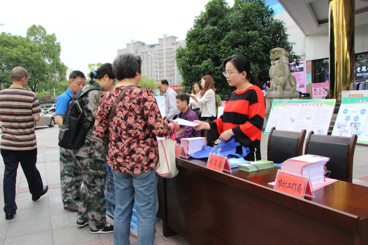 区司法局积极参与防灾减灾和非法集资宣传活动
