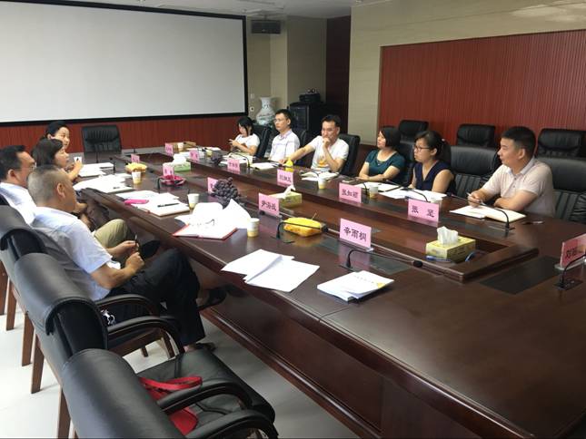 赴市地产发展中心学习交流党建工作