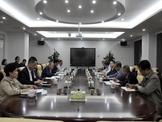 副市长何朝晖到国投集团和金控集团调研工作