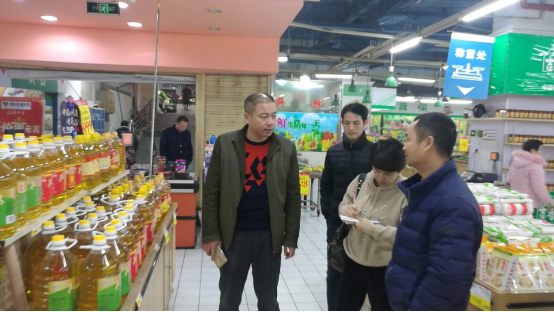 区民生办抽查区商粮局民生工程工作