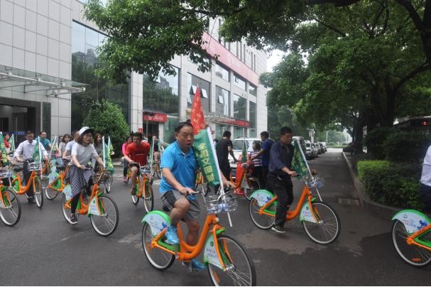 市国资委举行“以党建带团建，绿色清风，低碳骑行”活动