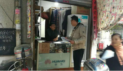 区商粮局开展在职党员进社区