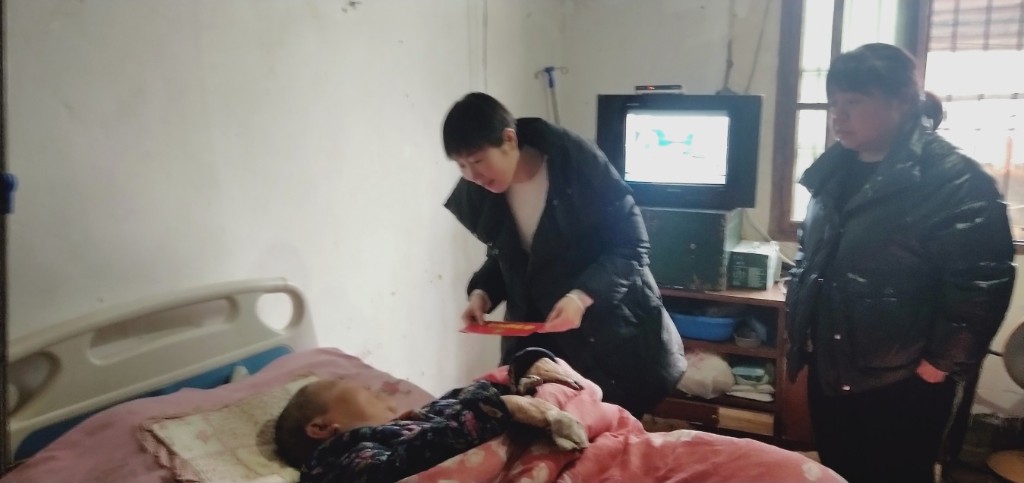 区残联:节前大走访 真情暖民心