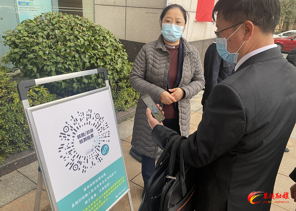 两会影像| 落实落细疫情防控措施 