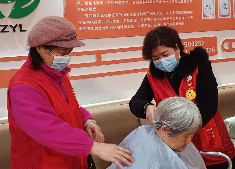 茨菇塘街道组织开展"学雷锋送温暖，服务进社区，幸福在身边"活动