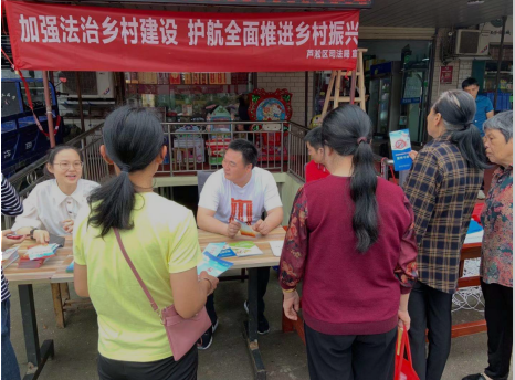 区司法局开展农村法治宣传教育月活动