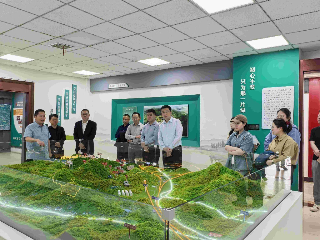 四川省同城化办到绿心九郎山地区开展调研